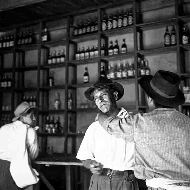 Three men in a Peruvian bar