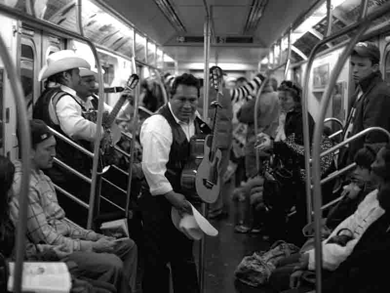 Mexican buskers in a NYC subway car