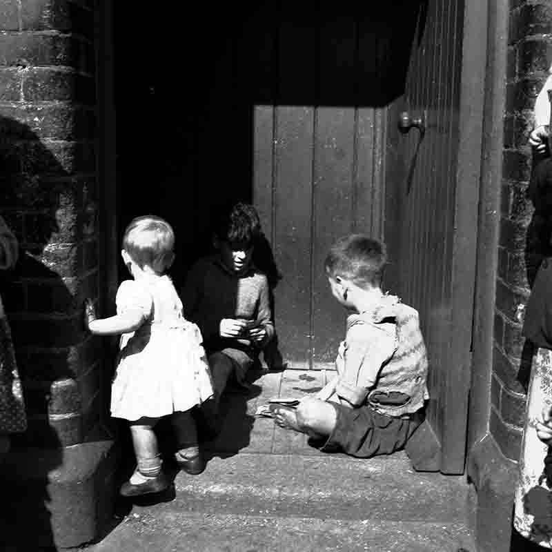 Children playing in a backyard in Dublin