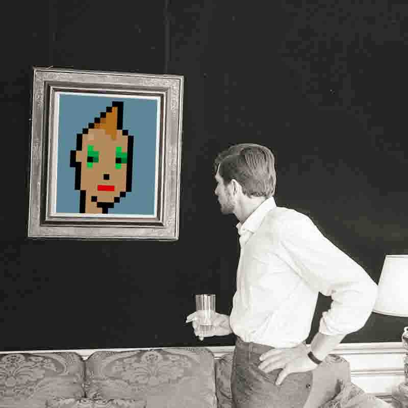 Man with drink in hand looking at a framed picture of Larva Labs, Crypto Punk #7610