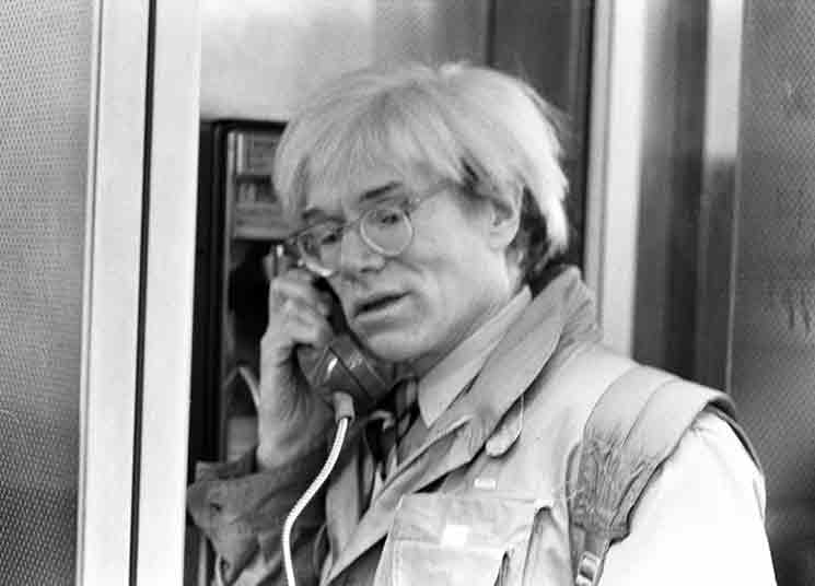 Andy Warhol in a public phone box