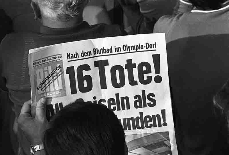 Man reads headline about terror attack during Munich Summer Olympic Games 1972