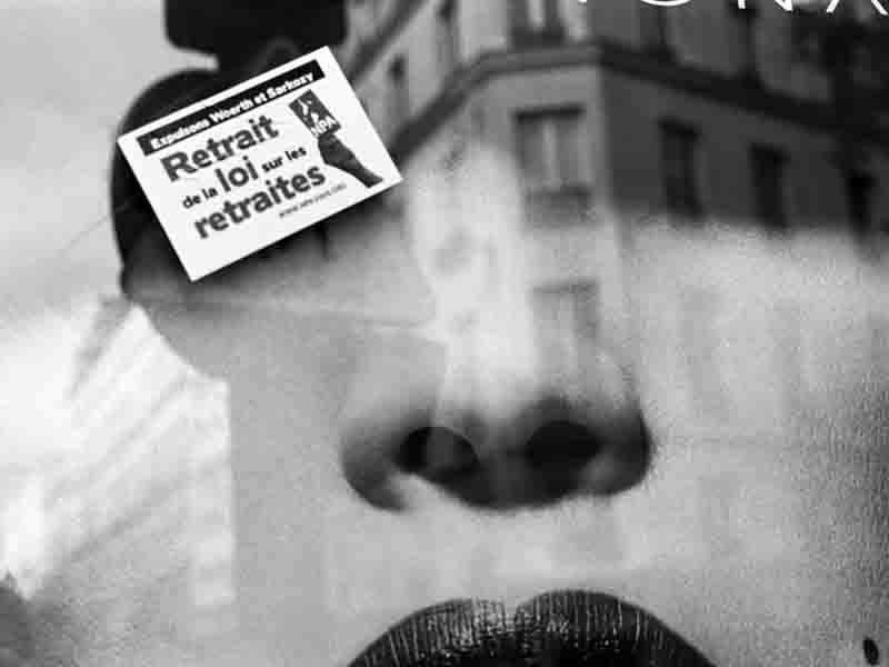 Fashion advertising with Paris street scene reflection