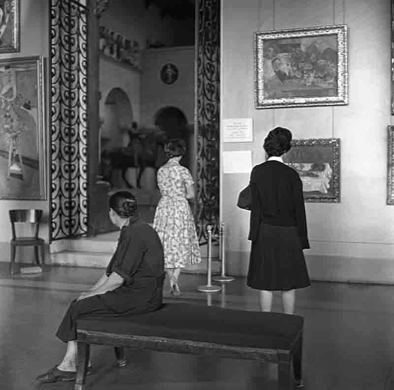 Visitors of Pushkin Museum of Fine Arts in Moscow