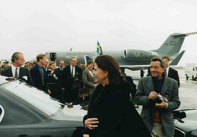 The Swedish Queen Silvia arrives at Munich Airport and meet photo journalist Peter Bock-Schroeder